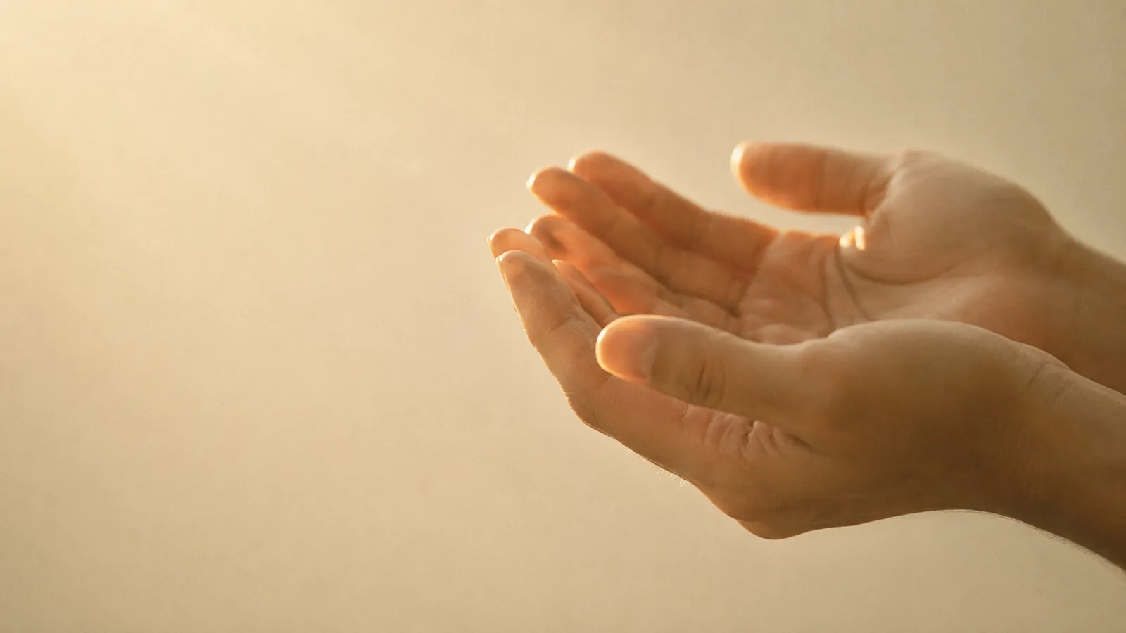 Open hands raised in supplication