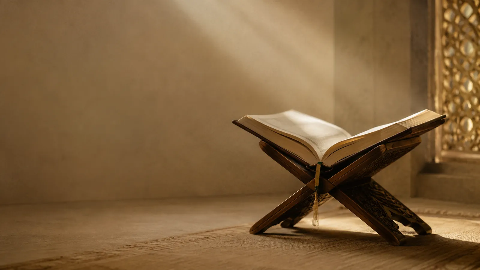 An open Qur'an on a wooden rehal in a sunbeam